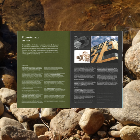 Le magazine Formes est ouvert sur des roches sombres et humides, présentant un article technique sur l’architecture et les matériaux innovants. Le contraste visuel souligne la rigueur et la modernité des sujets traités.